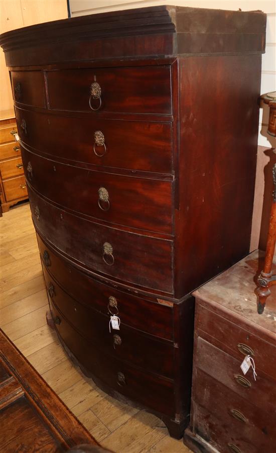 A Regency mahogany bow front chest on chest, W.125cm (a.f.)